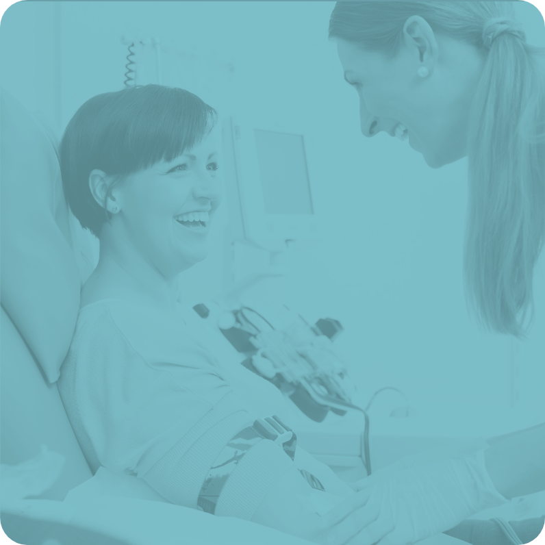 Plasma donation scene with staff supporting donor